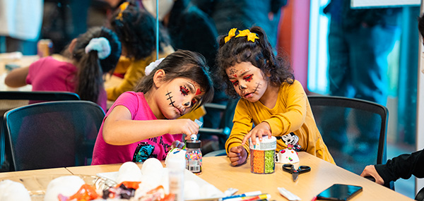 Children playing at a Day of the Dead celebration at El Centro